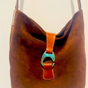 Dooney & Bourke Brown Suede Shoulder Bag or crossbody. You can adjust the straps